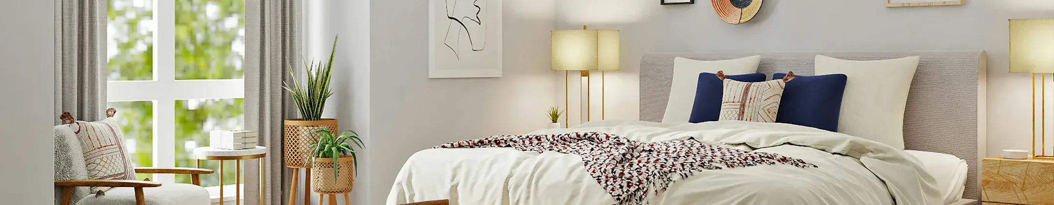 Comfortable bedroom with soft bedding, pillows and warm lighting