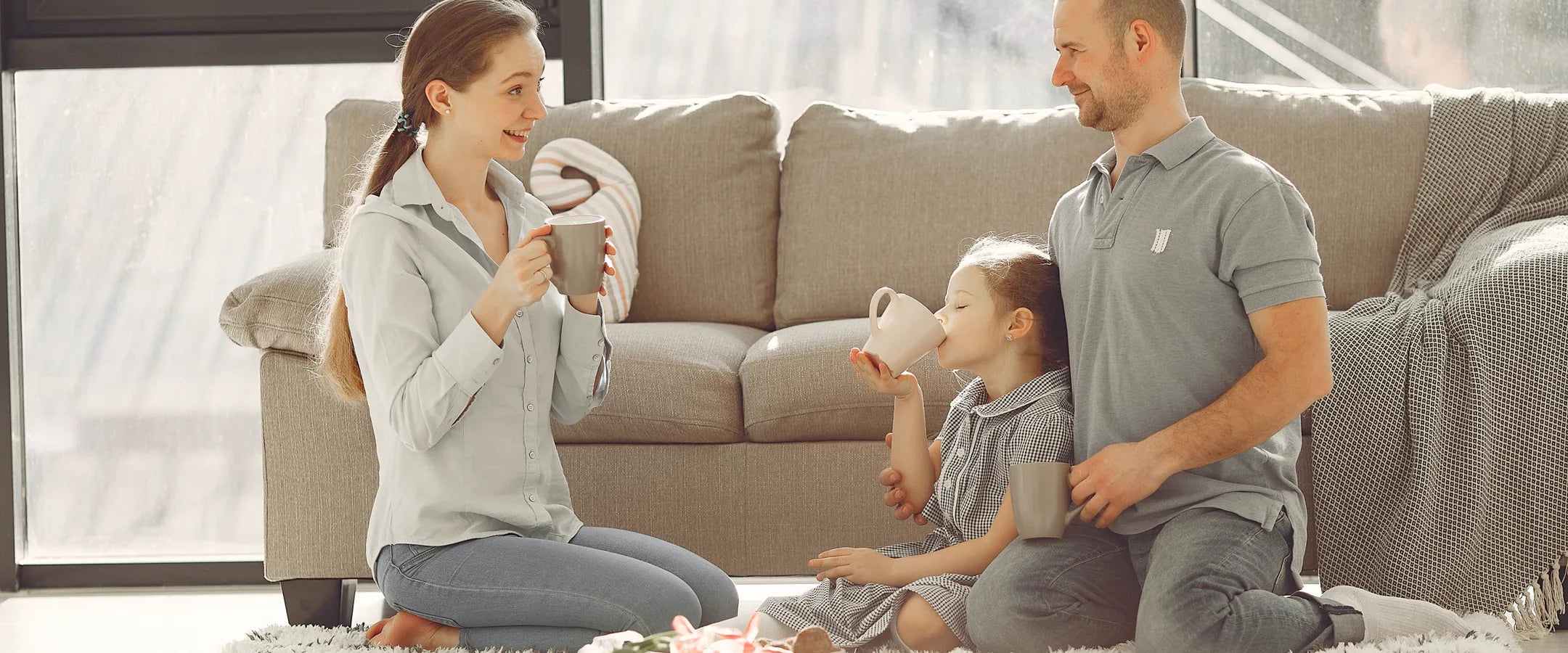 Family relaxing together in a bright living room