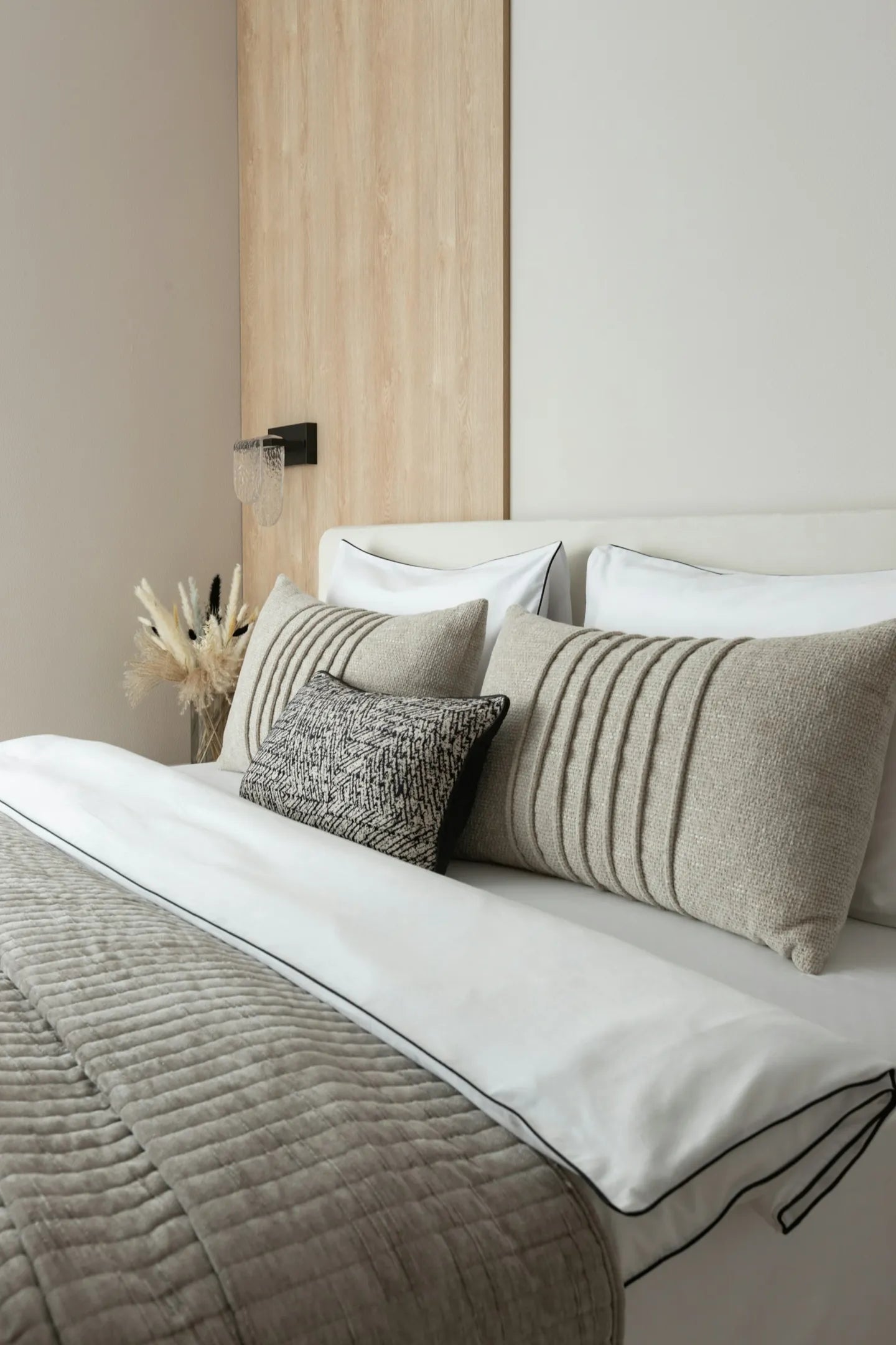 Comfortable bedding in a calm modern bedroom